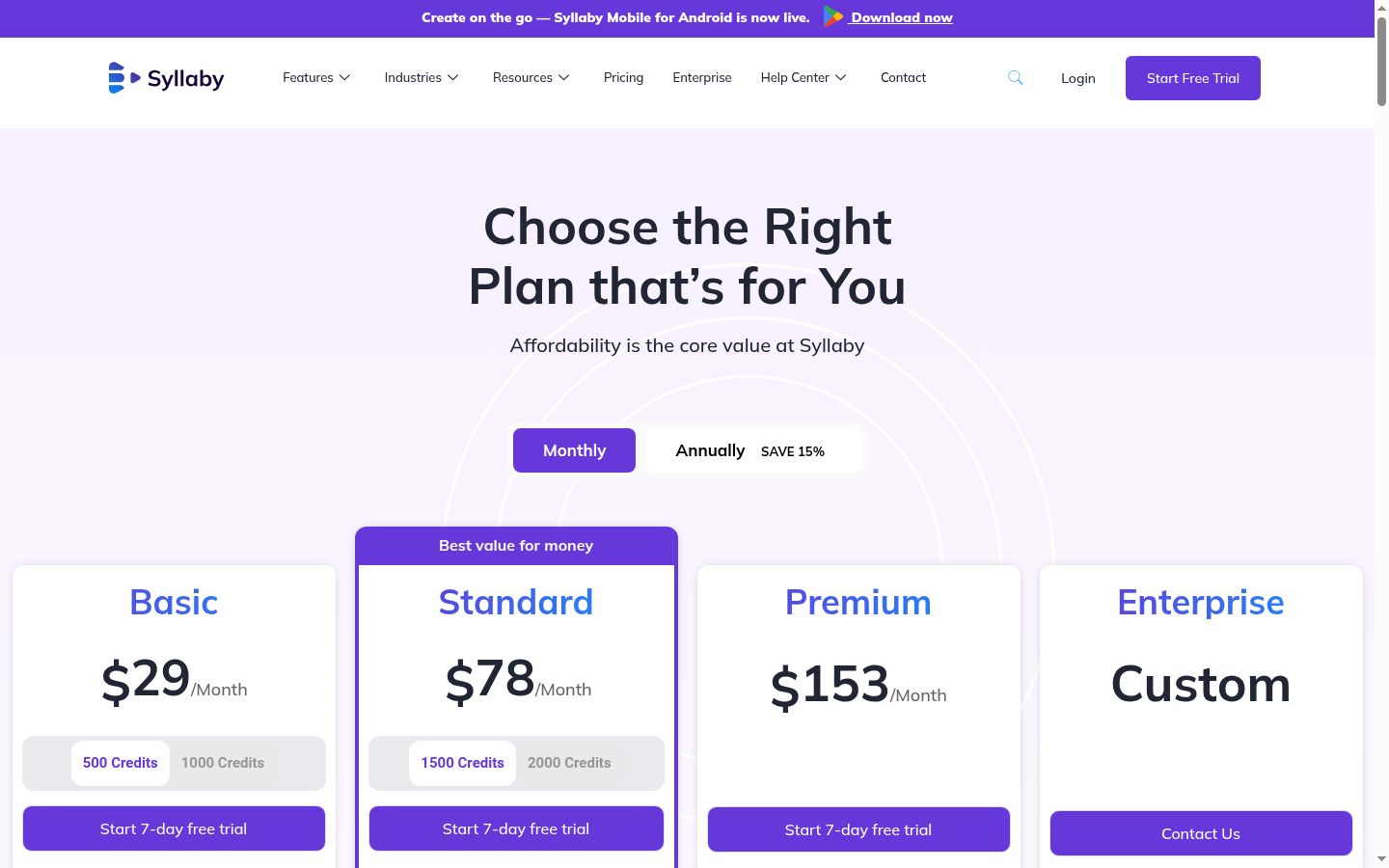 Syllaby pricing showing Basic plan at 29 dollars per month with 500 credits and 1 voice clone, Standard at 78 dollars per month with 1500 credits and 3 voice clones marked as best value, Premium at 153 dollars per month with 5000 credits and 5 voice clones, and Enterprise with custom pricing, all featuring video editor and six platform social media scheduling